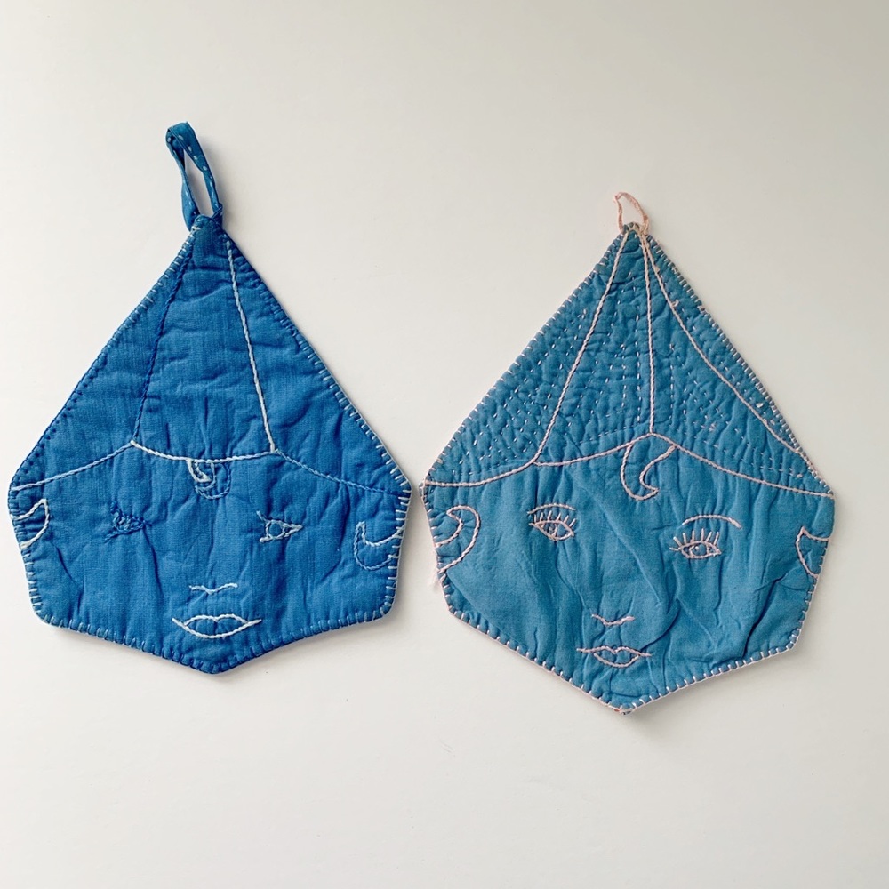 Set of two vintage handmade potholders.